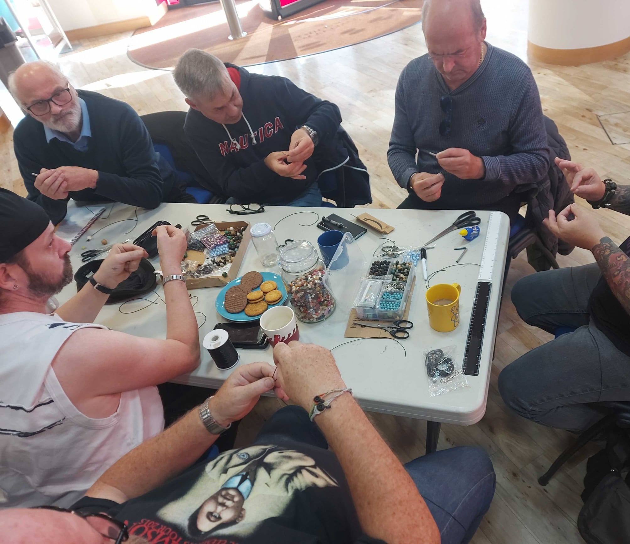 picture of a group of men doing crafts - Coventry Men