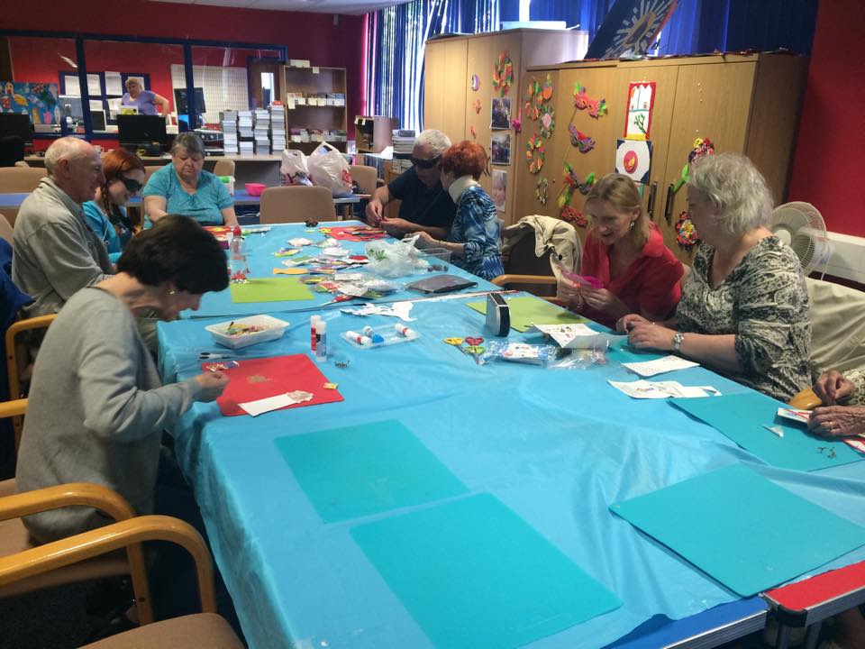 Picture of people doing crafts activities