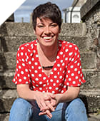 Picture of woman wearing a red shirt with white polka dots