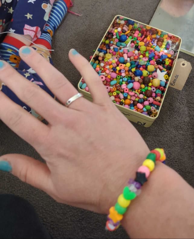 picture of a colourful bracelet made of beads